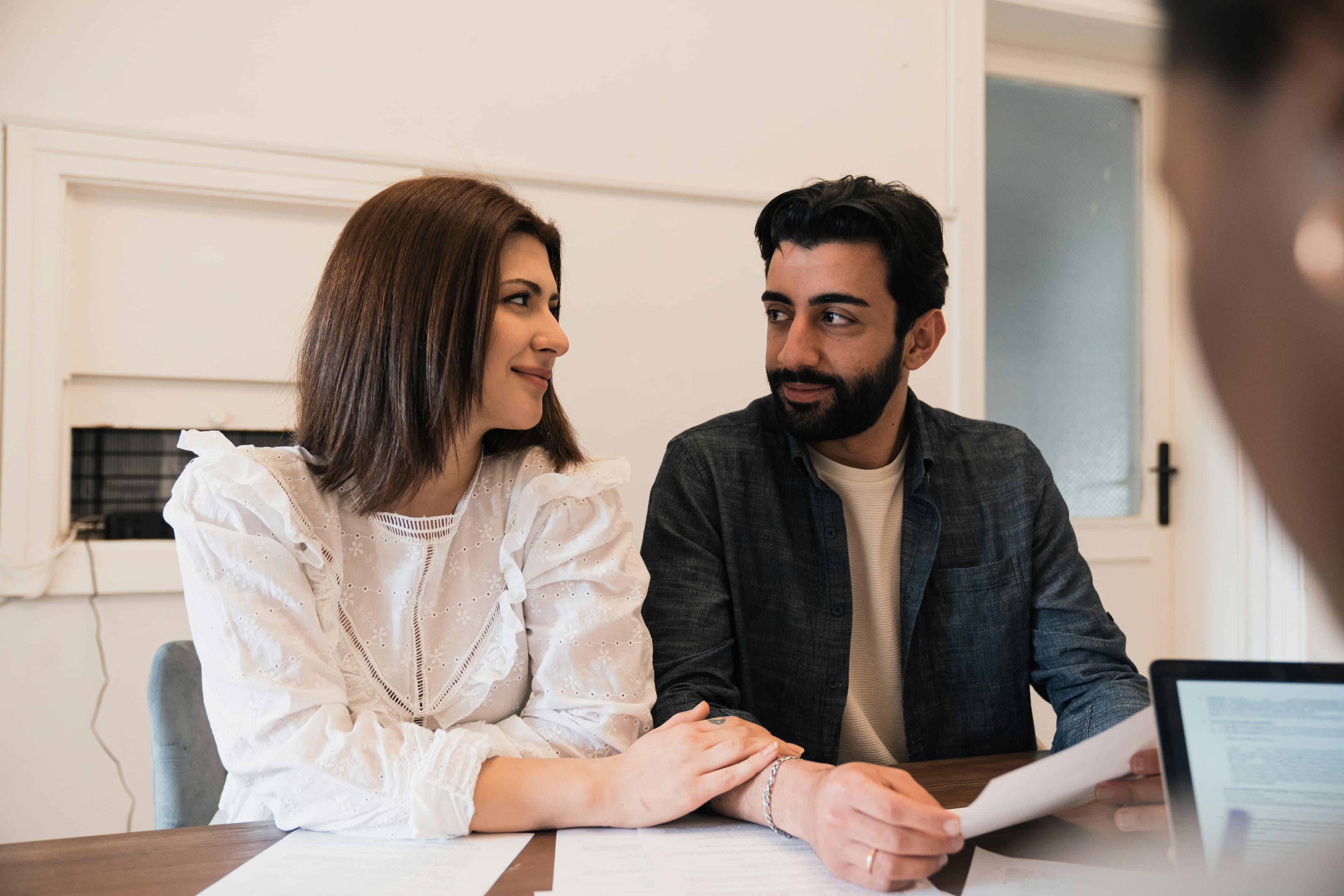 Family looking at paperwork together